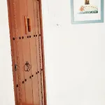 Quarto em Acomodações Particulares Bright With Ac And Rooftop Terrace In The Heart Of